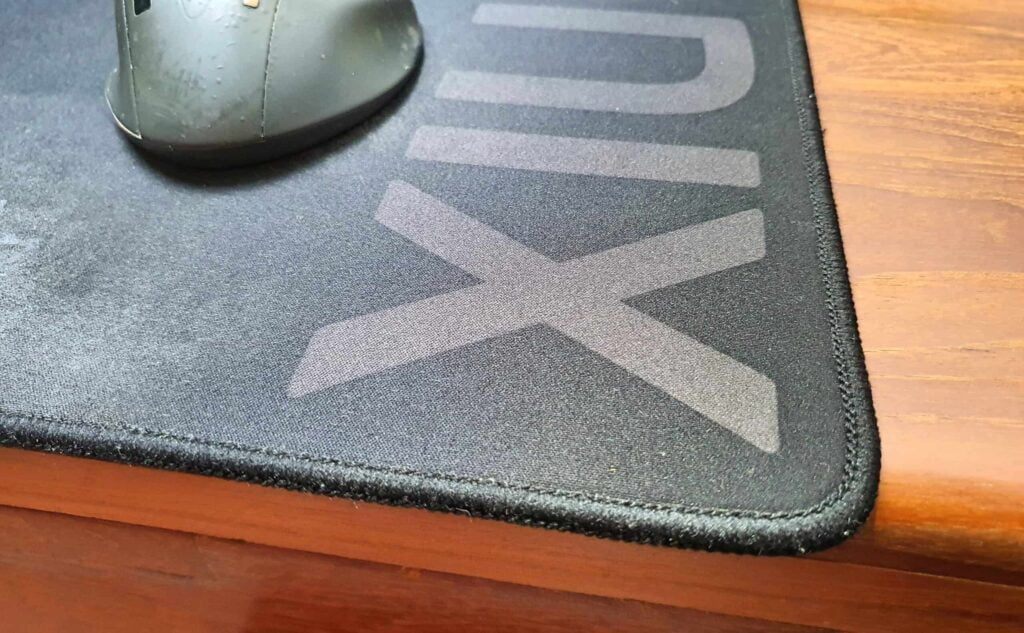 Mionix Alioth desk pad over the edge of my desk